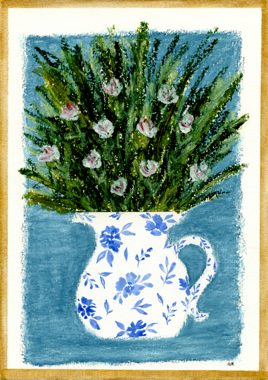 Framed artwork of a floral arrangement in a blue and white pitcher on a light blue background and a gold frame. Made with oil pastels.